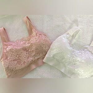 Two Rhonda Shear Lace Bralettes in Blush Peach and White.